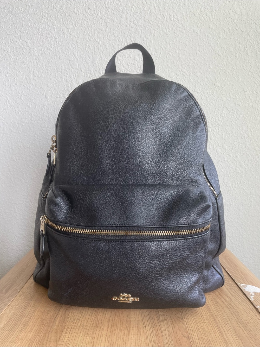 Coach Black Leather Backpack with Gold-Tone Accents